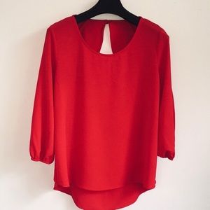 Charming Charlie Flutter Wing Hi Lo Blouse